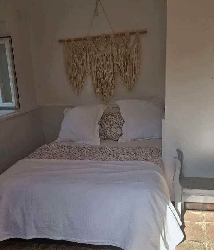 A restored bedroom in the Cottage