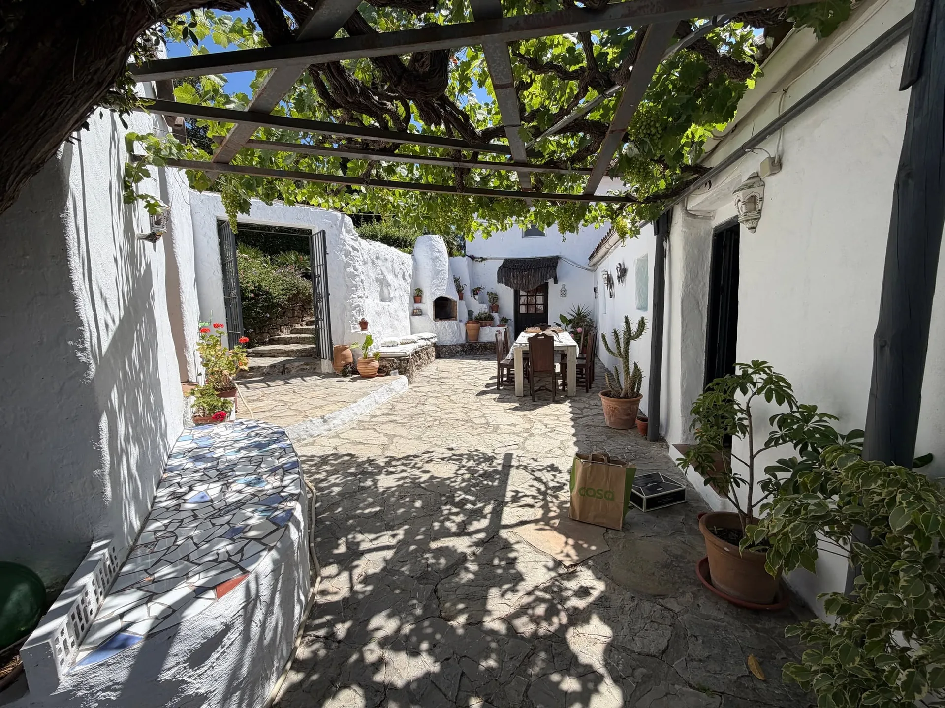 The estate's courtyard, with the Andalusian countryside beyond