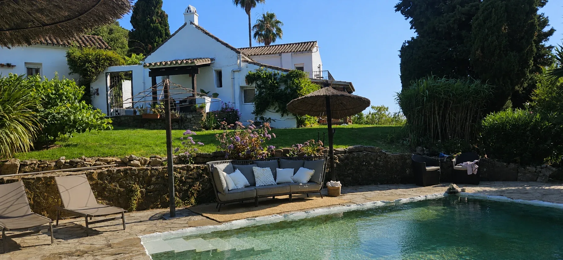 The Finca's pool and gardens